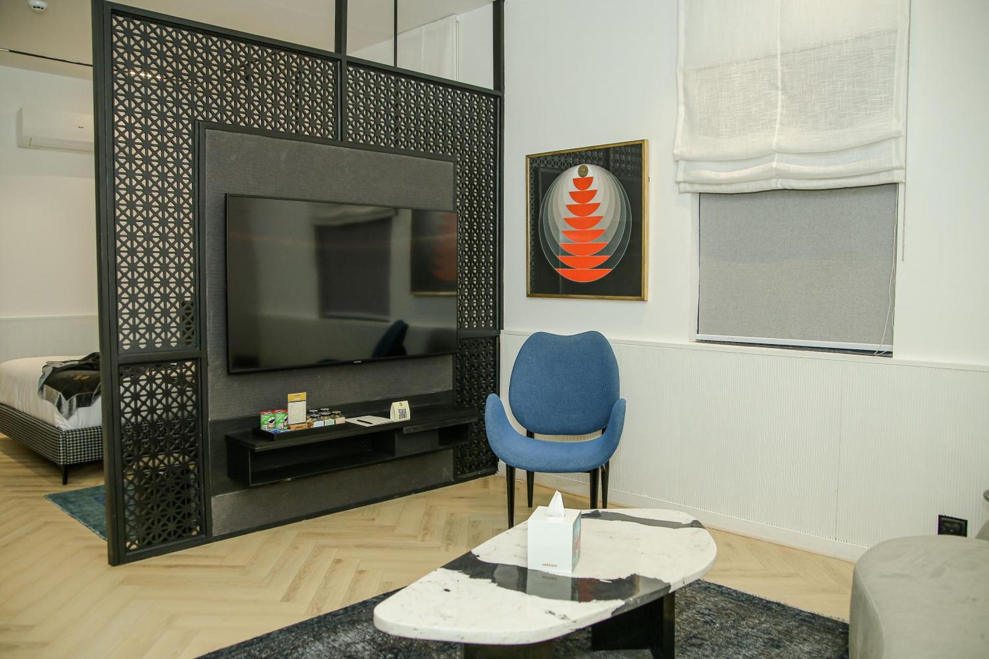 Ambiance Boutique Art Hotel Lahore Værelse billede A room divider
